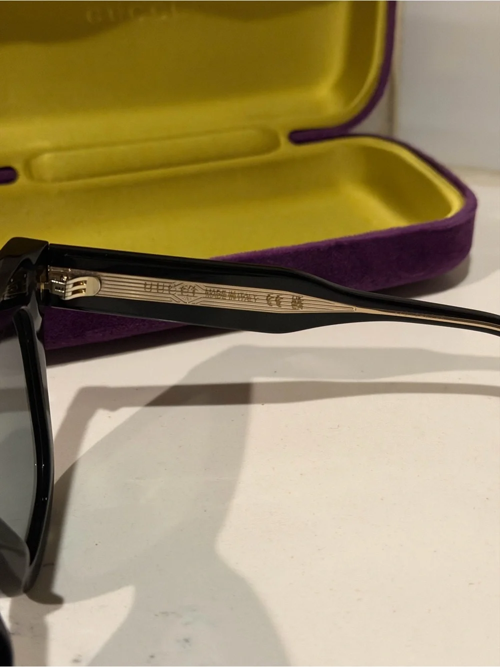 Gucci Black Frame Women's Sunglasses with Dark Lenses